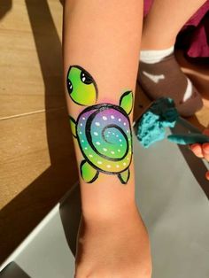 Snail Face Paint, Under The Sea Face Painting Easy, Sea Turtle Face Paint, Baseball Face Painting Ideas, Starfish Face Paint, Lilo And Stitch Face Painting, Ocean Face Painting, Beach Face Paint