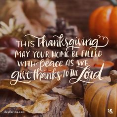 thanksgiving greeting with pumpkins and leaves on wooden table, overlayed with quote