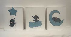 three little elephants are hanging on the wall in their nursery's room, and one elephant is holding a star