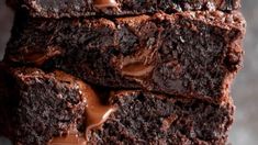 chocolate brownies stacked on top of each other