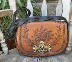 Another rare find...this is a very rustic tooled 60s hippie boho shoulder bag...everything is original and in great condition....I cleaned and oiled this bag but otherwise it did not need any work.... very good size too.... 12 inches across, 8 inches tall, gusset is 3 inches and the braided shoulder strap drop is 14 incheson the inside of the flap is has in ink Mexico 1963 written...not sure if that means this bag was created there.... Mexico Boho, Boho Shoulder Bag, 60s Hippie, Tooled Leather Purse, Tooled Leather, Vintage Bags, Leather Tooling, Leather Purse, Leather Purses