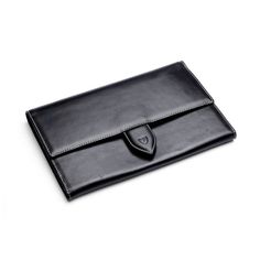 Deluxe Travel Wallet in Black | Aspinal of London Classic Travel Bags With Rfid Blocking, Elegant Black Leather Travel Accessories, Classic Rectangular Travel Accessories For Business, Elegant Wallet With Rfid Blocking For Daily Use, Luxury Wallets With Interior Card Slots For Business, Elegant Rfid Blocking Wallet For Daily Use, Luxury Business Wallets With Card Slots, Classic Clutch With Card Slots, Luxury Business Wallets With Interior Card Slots