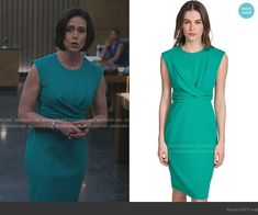 the good wife wears this green sheathed dress with an asymmetric neckline