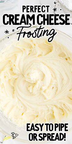 a bowl filled with cream cheese frosting on top of a table