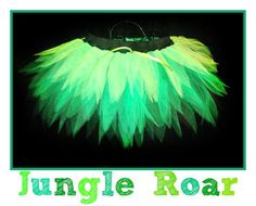 a green and yellow feathered bag with the words jungle roar on it's side