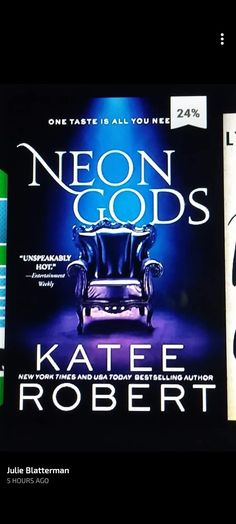 the book neon gods by kate robert is on display