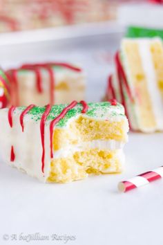 two pieces of cake with white frosting and candy canes