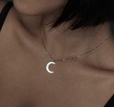 Nightside of Venus. This necklace is composed of solid sterling silver crescent moon charm, delicate diamond cut chain and components. A very sparkly gothic yet minimalistic piece with great detail. Makes a very impressive gift for moon lovers! Charm length: 0.8 inch // 2 cm You can choose between these chain lengths: 14 / 15 / 16 / 17 / 18 inches We add a 1 inch extender chain to all chokers for perfect fitting. ❈ We send all our items with registered mail. ❉ Due to the organic nature of stones, there might be a slight variation in colour, size and shape. ✺ All items come packaged in a quality velvet pouch ready for gift giving. ✽ If you want to make a special order, just contact us! Silver Half Moon Necklaces For Jewelry Making, Silver Half Moon Necklace For Jewelry Making, Elegant Crescent Nickel-free Necklace, Silver Crescent Clavicle Chain Jewelry, Minimalist Crescent Nickel Free Necklaces, Dainty Silver Moon Shaped Jewelry, Minimalist Crescent Nickel-free Necklaces, Minimalist Nickel Free Crescent Necklaces, Minimalist Crescent Nickel-free Necklace