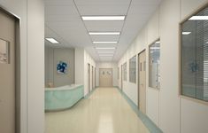 an empty hospital hallway with white walls and blue accents on the doors, along with two sinks