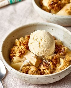 a bowl filled with fruit and ice cream