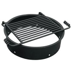 an image of a barbecue grate with grilling tools on the bottom and side