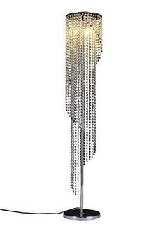 Romantic style crystal floor lamp,elegant design and beautiful decoration to your bedroom or waiting room Clear crystal raindrop,silver chrome finish high quality metal lamp body Tall: 59" Dia:10.6"; On/off switch on the cord,standard American plug Use 3 x 40 watts bulbs, E12 bulb base,bulbs not included Need to hang up crystal strings Crystal Floor, Crystal Floor Lamp, Silver Floor Lamp, Indoor Flower Pots, Floor Lamp Shades, Silver Chrome, Led Dimmer, Lamps For Sale, Beautiful Decoration