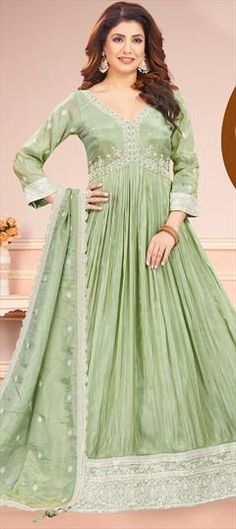 Green color Gown in Silk fabric with Embroidered, Thread, Zari work Elegant Fitted Gown In Pista Green, Elegant Fitted Pista Green Gown, Fitted Pista Green Gown With Intricate Embroidery, Green Anarkali Set For Formal Occasions With Traditional Drape, Green Anarkali Set With Traditional Drape For Formal Occasions, Formal Green Anarkali Set With Traditional Drape, Elegant Pista Green Floor-length Gown, Pista Green Floor-length Gown With Pallu, Embroidered Green Gown For Reception