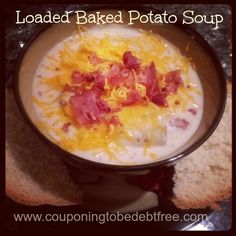 loaded baked potato soup in a bowl with bacon and cheese on top, ready to be eaten