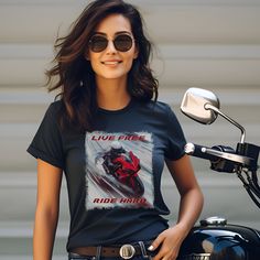 Embrace the thrill of the open road with our "Live Free, Ride Hard" ladies' biker t-shirt, perfect for women who love the freedom of riding. This graphic tee is a great gift for female bikers, offering a stylish and comfortable fit for any adventure. The unisex soft-style t-shirt puts a new spin on casual comfort. Made from very soft materials, this tee is 100% cotton for solid colors. Heather colors and sports grey include polyester. The shoulders have twill tape for improved durability. There Free Ride, Female Biker, Biker T Shirts, Like A Girl, Live Free, Girl Shirt, Lady Biker, Open Road, Tees For Women