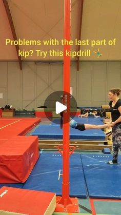 a woman standing on top of a blue trampoline in an indoor gym with the caption, problems with the last part of kip? try this kpiidrill