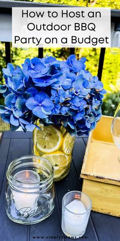 an outdoor bbq party on a patio with blue hydrangeas and lemons