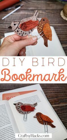 an open book with paper birds on it and the title diy bird bookmark