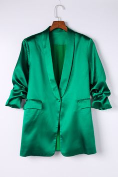 Look stylish and sophisticated in this Green Lapel Collar Pocketed Satin Blazer.Crafted from a blend of 95% Polyester and 5% Elastane. this blazer is designed to provide you with a comfortable fit and a flattering silhouette.The lapel collar and pocketed design add a touch of sophistication to the look. while the satin fabric gives it a luxurious feel.The blazer is perfect for any formal occasion. from a business meeting to a wedding.The green color adds a pop of color to any outfit. making it a Leopard Satin Dress, Bodycon Tops, Satin Blazer, Lapel Blazer, Chambray Dress, Outfit Making, Business Meeting, Shorts Jeans, Look Stylish