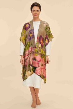 This kimono features a stunning large botanical print, with an open front and sides for a breezy and oversized fit. Elevate your fashion game with this versatile and on-trend piece. Length: 39 1/2", Flat Width: 37" 100% Wool Hand Wash Cold Style: WWA1 Spring Floral Print Oversized Outerwear, Oversized Floral Print Spring Outerwear, Oversized Floral Print Outerwear For Spring, Spring Silk Kimono For Daywear, Multicolor Wrap Outerwear For Spring, Multicolor Wrap Spring Outerwear, Spring Multicolor Wrap Outerwear, Floral Print Shawl Kimono For Spring, Spring Shawl Kimono With Floral Print