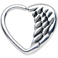 a heart shaped metal object with spikes on it