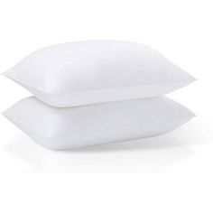 two white pillows stacked on top of each other