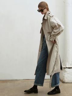 Editor's notesWhether the elements with this double-breasted trench featuring our iconic turn-lock hardware for a heritage touch. Crafted in a sturdy poly blend, the transitional, belted silhouette is finished belting at the sleeves.- Oversized collar- Front and back panel- Double-breasted button closure- Deep back vent- Maxi long trench coat- Angled side pocketsMeasurements(in.)- Size: One size(XS-M)- Chest: 23.62in- Sleeve: 27.56in- Length: 45.28in- Model Info: 5' 7 / BUst 32.28in / Waist 23.6 Workwear Outerwear With Belt Loops, Classic Long Coat With Belt, Classic Belted Outerwear For Work, Classic Outerwear With Belt Loops For Work, Classic Fall Outerwear With Belt, Classic Spring Outerwear With Belt Loops, Spring Gabardine Outerwear With Belt Loops, Classic Belted Outerwear For Fall, Spring Double-breasted Outerwear With Belt Loops