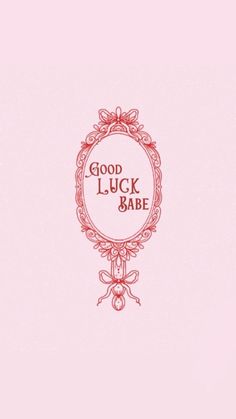 the words good luck babe are written in red on a light pink background with an ornate frame