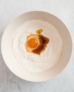 a bowl with some food in it on a table