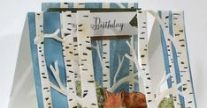 a birthday card with an image of a fox and birch trees in the background,