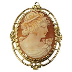 14 Karat Yellow Gold Cameo Brooch/Pendant- This elegant cameo features a lovely lady in profile set in beautifully detailed 14K yellow gold. Can be worn as a brooch or a pendant. Size: 49 mm x 36 mm Weight: 7.1 dwt. / 11.1 gr. Stamped: 14K Very good condition, professionally polished. Will come packaged in a gift box or pouch (when possible) and will be shipped U.S. Priority Mail Insured. DV051622/17KCS Brooch Diamond, Cameo Jewelry, Vintage Cameo, Antique Brooches, Carved Shell, Cameo Brooch, Cameo Pendant, Pin Pendant, Filigree Design