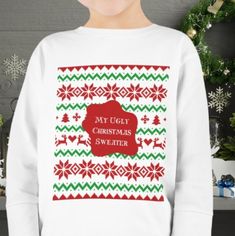 Make the holiday season even more adorable with our Ugly Christmas Sweater Long Sleeve T-Shirt for Toddlers. Featuring a charming and whimsical ugly sweater design, this long-sleeved t-shirt adds a playful touch to your toddler's holiday outfit. The vibrant colors and quirky patterns capture the spirit of the season, making it a delightful choice for family gatherings, holiday photos, and festive celebrations. Holiday Attire, Holiday Outfit, Sweater Design, Design T Shirt, Holiday Photos, Ugly Sweater, Ugly Christmas, Christmas Sweater, San Jose