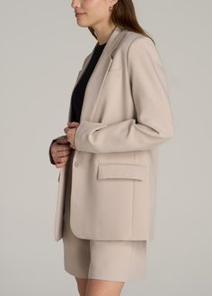 Chic Redefined: The Best Blazer for Tall Women The Trendy Professional's Go-To Our Relaxed Single-Button Tall Blazer is a symbol of sophistication for ladies over 5'9". This tailored blazer, with its fully lined design and padded shoulders, offers a flattering fit and unparalleled comfort with a modern edge. The chest patch pocket adds a functional element to its elegant design. Perfect for professional settings or special occasions, this blazer for tall women is a wardrobe must-have. Relaxed fi Blazer For Women, Best Blazer, Single Button Blazer, Tailored Blazer, Tall Women, Boyfriend Fit, Blazers For Women, Patch Pocket, Elegant Design