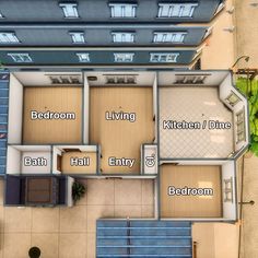 an overhead view of a floor plan for a two story house with several rooms and bathrooms