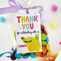 a thank you bag with jelly beans in it and a tag that says, thank you for celebrating with me