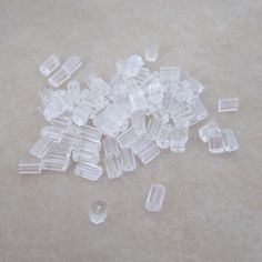 small clear plastic beads are scattered on the floor