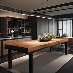 a large wooden table sitting in the middle of a room