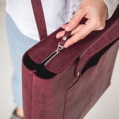 This handmade women tote bag is produced of crazy horse leather. It has one pocket inside. The bag has a high-quality zipper that secures your belongings. It holds the shape perfectly and you may be confident that your personal things like cell phone, tablet, lap-top are safe. This bag is simple, reliable, and durable. Its universal look allows to use the tote bag for various purposes. One may take the bag to the work, shopping, meeting, or walk and feel comfortable with it at any conditions. SI Simple Leather Bag, Mens Tote Bag, Handmade Leather Tote Bag, Soft Leather Purse, Personal Things, Leather Shopper Bag, Lap Top, Diy Leather Bag, Leather Anniversary