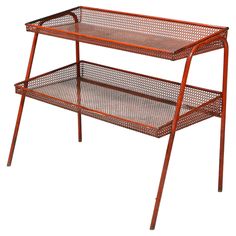 two tiered serving tray with metal handles on each side and an open shelf underneath