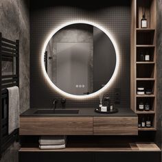 a bathroom with a round mirror above the sink and shelves on either side of it