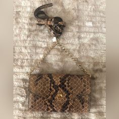 Brand New With Tags Mk Snake Skin Cross Body. Has Some Minor Print Bleeding On The Inside Flap Only. Michael Kors Brown Bag With Chain Strap, Michael Kors Gold Bag With Adjustable Strap, Gold Michael Kors Bag With Adjustable Strap, Chic Michael Kors Brown Shoulder Bag, Leather Drawstring Bags, Michael Kors Backpack, Michael Kors Wristlet, Trunk Bag, Backpack Charm