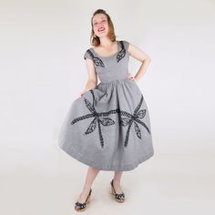 "I love this dress's mix of showy and casual, sequins and gingham! Clearly (from the length) early 1950s in vintage, the dress is labeled Jay Original - Mel Warshaw Inc., Miami. The dress is made of crisp cotton gingham in black and white checks. The bodice is fitted and there are small cap sleeves. The neckline is fairly low, front and back. The skirt of the dress is very full, falling from gathers all around; the circumference at the hem is about 140\". Decorating the dress is glossy black ray Fitted Gingham Party Dress, Fitted Gingham Dress For Party, Casual Gingham Dress For Party, Dress Trims, Body Condition, Full Skirt Dress, Rockabilly Dress, Check Dress, 50s Dresses