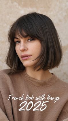 Fall in love with the classic yet modern French bob with bangs for 2025! This elegant, face-framing short hairstyle adds effortless beauty and sophistication, perfect for any occasion. Soft, dark layers combined with natural texture make it one of the most iconic hair trends 2025. Save this pin for ultimate bob inspiration! 💇‍♀️✨ Classic French Bob With Bangs, Dark Bob With Curtain Bangs, Dark Straight Hair With Bangs, Women's Bob Haircut, Bob With Bangs Styling, Grey French Bob With Fringe, Textured Bob Haircut With Bangs, Bob With French Bangs, Short Bangs With Layers