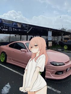 a woman standing next to a pink car in a parking lot