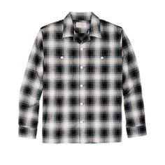 Made with sturdy 7-oz. cotton, our Elk Heights Camp Shirt is ideal for three-season wear. The sturdy flannel fabric is brushed for comfort from the first day. The camp collar is unstructured, sewn directly to the shirt so it lays flat and open. This comfortable design originated in warm climates and is sometimes known as a Cuban collar. Characteristic of camp shirts, the hem is straight for casual untucked wear. Dual knife pleats in the rear shoulder provide ease of motion. Buttons secure the no-flap chest pockets. Button-adjustable cuffs. | Filson Elk Heights Camp Shirt BlkGryShdw Size Medium Camp Shirts, Knife Pleats, Comfortable Design, Camp Shirt, Flannel Fabric, Camping Shirt, First Day, Chest Pocket, Elk