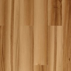 a close up view of the wood grains on a wooden flooring paneled with light brown stain