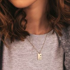 ELEGANT ENGRAVED RECTANGLE NECKLACE Latest trend and add to our contemporary collection this elegant engraved rectangle necklace. A sophisticated, delicate profile holds a unique meaning: up to four names engraved with a heart. An extraordinary gift to treat somebody you love. CHARACTER LIMIT Max 10 letters per name ITEM SPECIFICATIONS • Finish: 18K Gold ∙ 925 Sterling Silver ∙ Rose Gold• Dimensions: Adjustable Length Chain 15” | Pendant 12x18mm Elegant Engraved Charm Necklace With Rectangular Pendant, Elegant Engraved Charm Necklaces With Rectangular Pendant, Minimalist Hand Stamped Rectangular Pendant Necklace, Dainty Engraved Rectangular Charm Necklace, Gift Rectangular Pendant Bar Necklace, Hand Stamped Rectangular Necklaces For Mother's Day, Gold Rectangular Bar Necklace, Rectangular Charm Necklaces For Everyday, Elegant Rectangular Etched Necklace