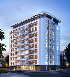 an artist's rendering of a modern apartment building at dusk with cars parked in front