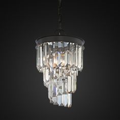 a crystal chandelier hanging from a ceiling