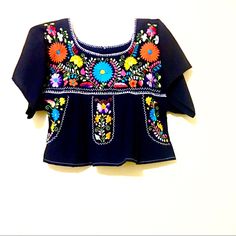 Mexican Blouse Note: Black Crop Top Embroidered Slouchy Boxy Bohemian Mexico Traditional Blue Embroidery Rare Ooak Piece Size: S/ M M/L Xl Black Summer Tops With Intricate Embroidery, Black Tops With Intricate Embroidery For Summer, Black Embroidered Tops For Summer, Black Cotton Blouse With Geometric Embroidery, Traditional Black Blouse With Floral Embroidery, Black Blouse With Intricate Embroidery For Festival, Traditional Embroidered Black Tops, Black Floral Print Festival Blouse, Black Tops With Intricate Embroidery For Festival